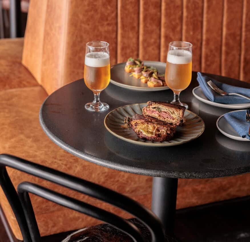 Steersons bar table set with food and drinks